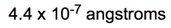 Calculation result: 4.4 x 10^-7 angstroms for the radius of a nucleus.