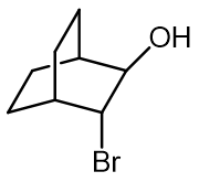 Chemical structure of a compound with OH and Br groups for elimination reaction analysis.