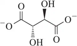 Line-angle drawing of a molecule, highlighting lone pairs and functional groups, including hydroxyl and carboxyl groups.