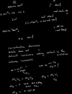 Handwritten notes on calculating mass of NaCl from molarity and volume