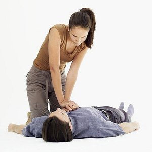 Person performing CPR chest compressions