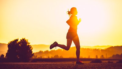 Runner at sunset, representing aerobic endurance training