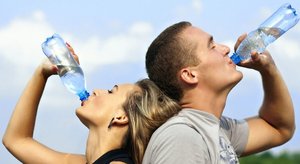 People drinking water, illustrating the importance of water for survival