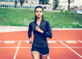 Athlete running, representing high energy needs