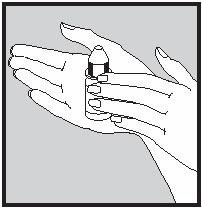 Warming ear drop bottle in hand