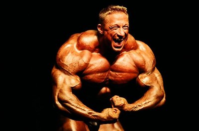 Bodybuilder showing developed muscles