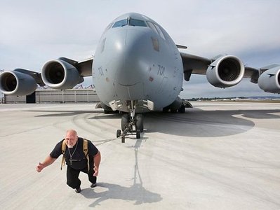 Spotter assisting with bench press