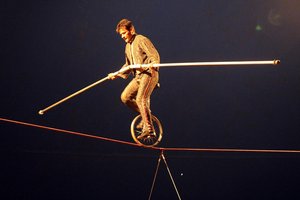 Tightrope walker balancing