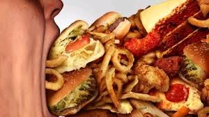 Person eating unhealthy food