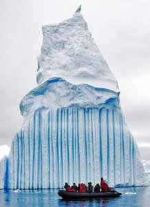 Large iceberg floating in water