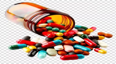 Assorted pharmaceutical drugs spilling from a bottle