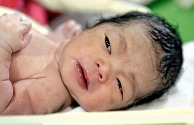 Newborn baby representing population growth