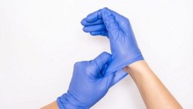 Gloved hands for lab safety