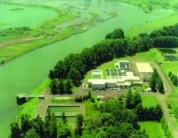 Aerial view of a water treatment plant near a river