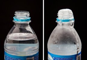 Photo of liquid and frozen water in a bottle