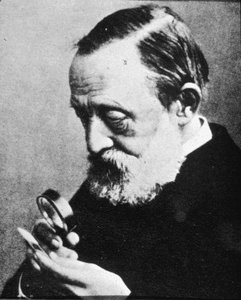 Historical figure using a microscope