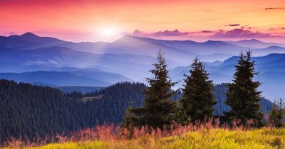 Sunrise over mountains, symbolizing environmental light cues