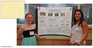 Scientists presenting research at a conference