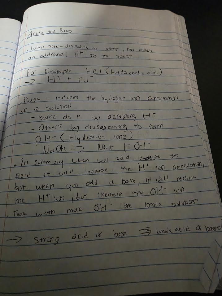 Handwritten notes on acids and bases, including definitions, examples, and equations for HCl and NaOH dissociation