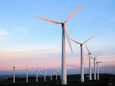 Wind turbines converting kinetic energy to electricity