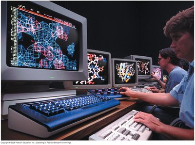 Scientists analyzing molecular structures on computer screens