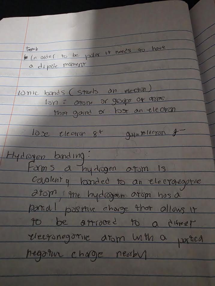 Handwritten notes on polarity, ionic bonds, and hydrogen bonding