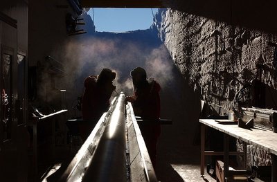Scientists working with an ice core sample