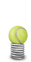 Tennis ball on compressed spring representing high potential energy