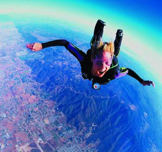A skydiver approaching terminal velocity, illustrating the concept of a limit in velocity due to air resistance.