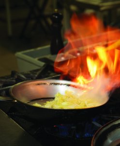 Flambé is a cooking technique in which alcohol is added to food and heated until the alcohol ignites.