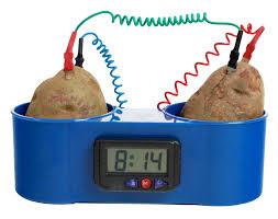 Potato battery powering a clock, demonstrating a simple electrochemical cell
