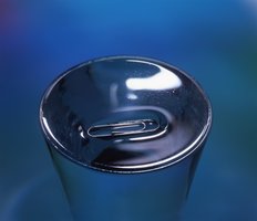 Paper clip floating on water due to surface tension