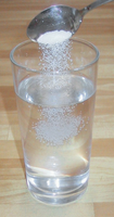 Solubility demonstration: dissolving salt in water