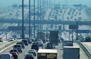 Highway with many vehicles, illustrating fossil fuel use