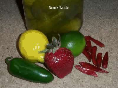 Examples of sour-tasting foods (lemon, lime, strawberry)