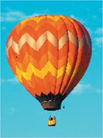 Hot air balloon rises due to Charles's Law