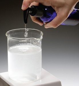 Soap being added to water