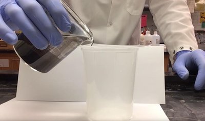 Decanting: pouring off water from sand