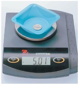 Electronic balance showing mass measurement