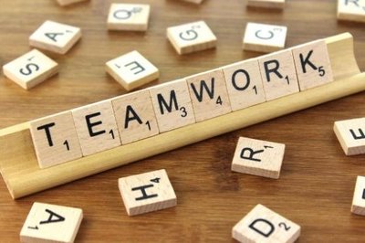 Teamwork graphic with scrabble tiles