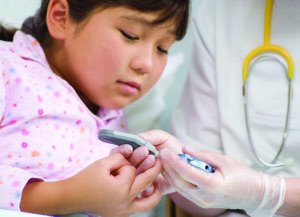 Doctor administering a medical test to a child, illustrating the importance of equilibrium in blood pH regulation
