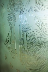 Etched glass, illustrating the use of hydrofluoric acid in glass etching