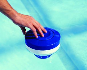 Chlorine dispenser in a swimming pool, illustrating hypochlorous acid formation