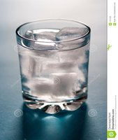 Glass of water with ice, illustrating thermal energy transfer