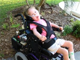 Child with SMA in wheelchair