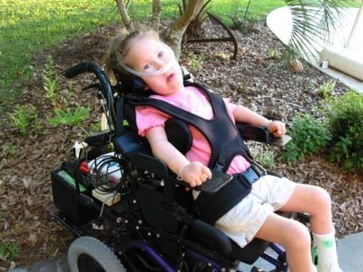Child with SMA in wheelchair