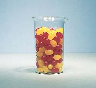Beaker with red and yellow objects representing counting units (mole concept)