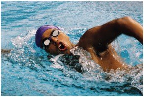 Person swimming as an example of kinetic energy