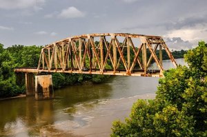 Rusting bridge due to acid rain corrosion