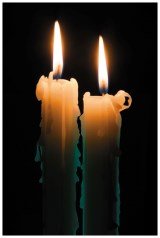 Candle burning in a combustion reaction